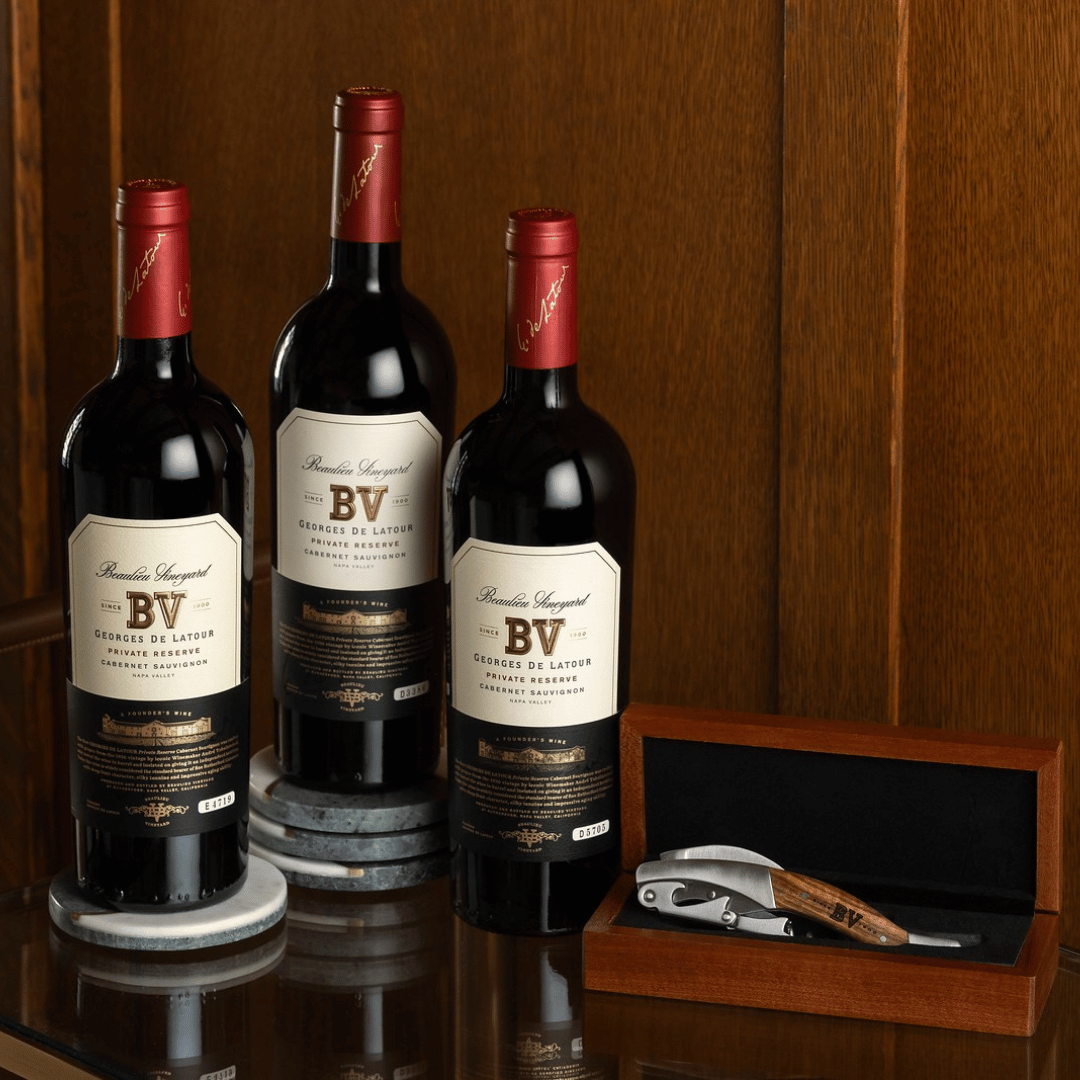 3 bottles of Georges de Latour Private Reserve and a corkscrew in a box