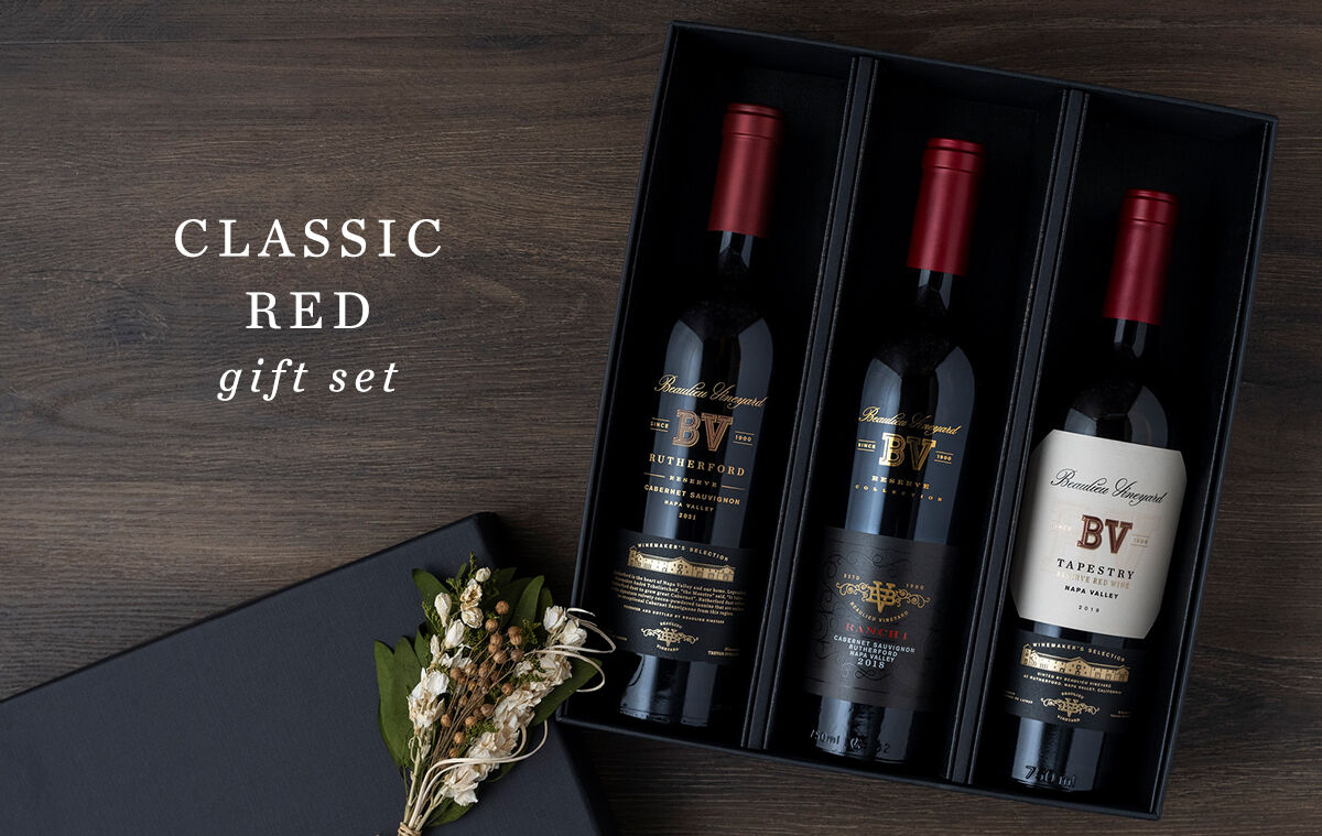 3 bottle gift set and flowers