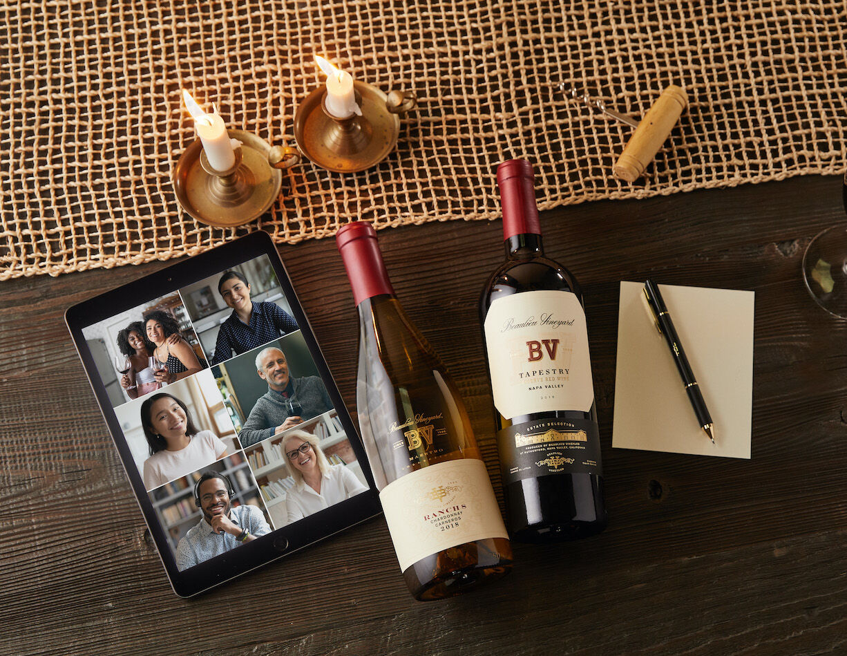 video call on tablet with BV wine bottles